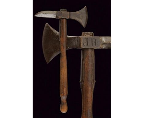 dating: Mid 19th Century provenance: France, Iron head with round-edged axe-blade and parrot-shaped rear fluke, quillon block