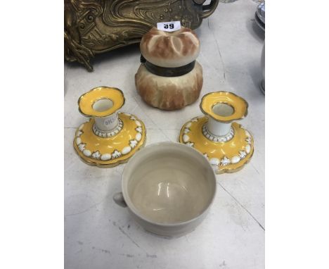 A Royal Worcester pot A Belleek sugar bowl and a pair of Tuscan candlesticks