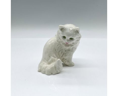 A glossy white figure of a fluffy feline with green eyes. Goebel marked on the underside. Dimensions: 3.25"L x 2.5"W x 3.25"H
