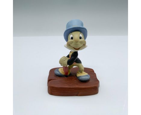 Jiminy Cricket, standing with a spring in his step, gracefully holds his umbrella down. Walt Disney Classics backstamp. This 