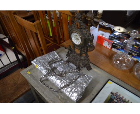 A lady's bag; together with a mantle clock