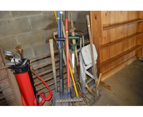 A large quantity of long handled gardening tools etc