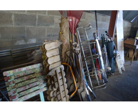 A quantity of long handled gardening tools etc