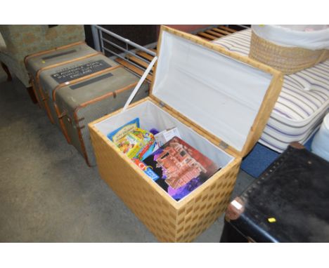 A dome topped trunk and contents of various puzzles and games