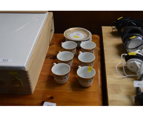 Six coffee cups and saucers