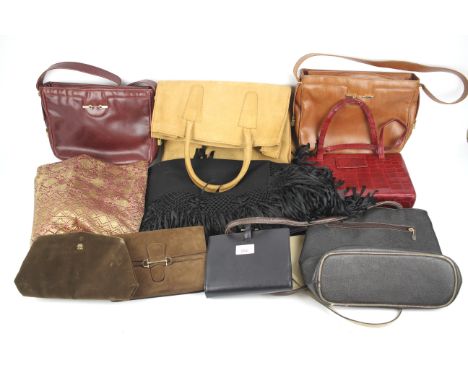 A collection of vintage ladies handbags. Of assorted colours and designs including leather examples