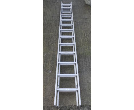 A modern two section aluminum ladder. Each section approx 345cm long