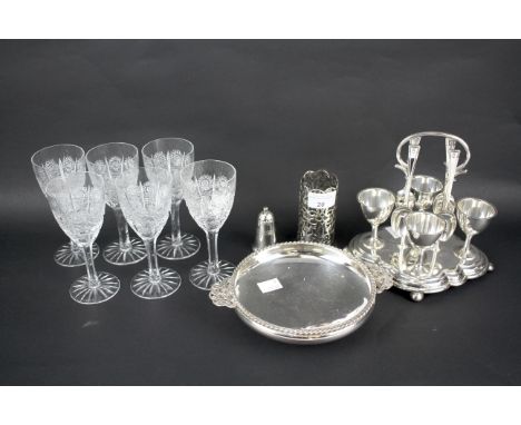 A collection of silver plated mixed wares. Including an egg cup cruet, small round dish, a pepper and six vintage crystal win