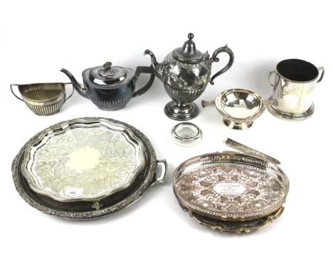 An assortment of vintage and modern silver plated wares. Including coffee pot, assorted trays, etc.