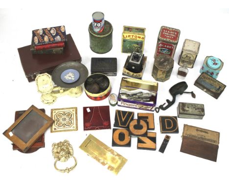 An assortment of collectables. To include vintage tins, scales, silver plated flatware, etc