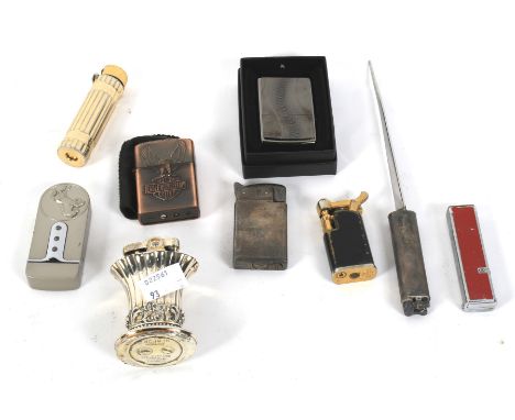 A collection of lighters. Including a antique style Ronson table lighter, an adapted Dunhill, boxed Zippo, etc