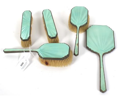 A George V five piece silver and enamel dressing table set. hallmarked Birmingham 1929, with light green engine turned decora