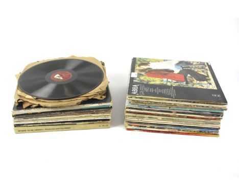 A collection of vinyl records. Including 'Abba, Greatest Hits', 'The Best of Michael Jackson, 'Elton John', etc, the majority