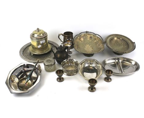 An assortment of silver plated wares. To include egg cups, trays, lidded biscuit barrel, tankard, etc