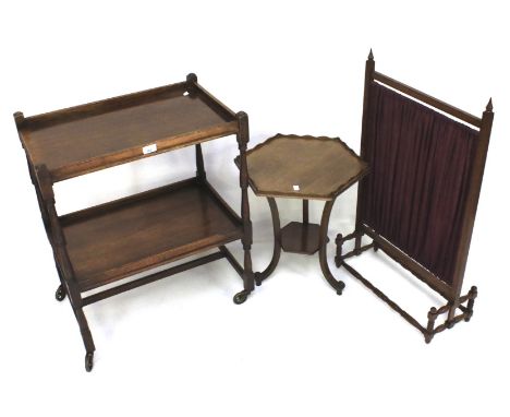 Three pieces of furniture. Comprising an oak tea trolley, two tier, a stained wooden mounted fire screen and a mahogany side 