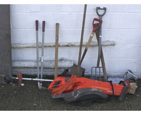 Assorted garden related tools. To include a petrol strimmer, Flymo leaf blower, garden fork etc