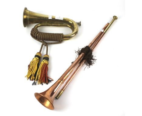 A brass bugle and a brass two section coaching horn. The bugle measuring approximately 28cm long