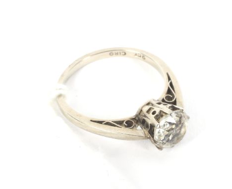 A white metal solitaire ring. Marked '9ct Cairo', set with a single colourless stone, size J/K, 1.9g