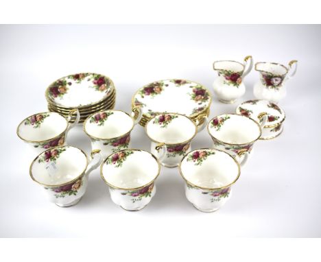 A Royal Albert Old Country Roses part tea set. To include tea cups, saucers, two cream jugs, etc