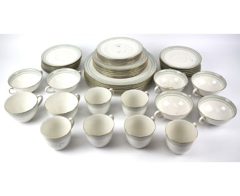 A Royal Doulton Berkshire pattern part tea and dinner service. To include dinner plates, tea cups, saucers, soup bowls, etc
