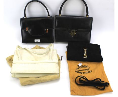 Four vintage handbags marked Gucci. Together with a Gucci bag cover, largest 26cm wide Condition Report: All bags have marks 