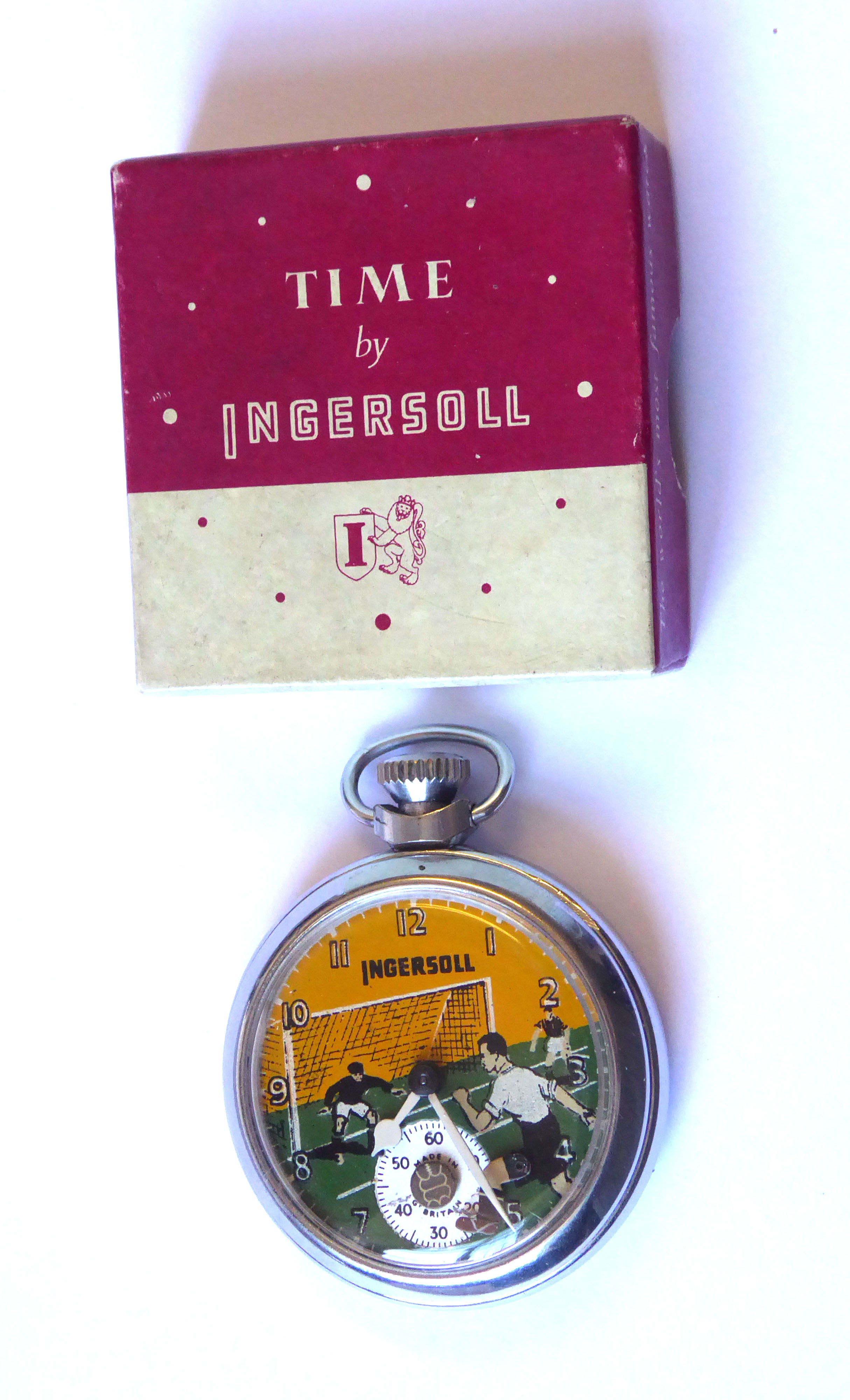 A 1950S STAINLESS STEEL INGERSOLL AUTOMATON FOOTBALL POCKET WATCH