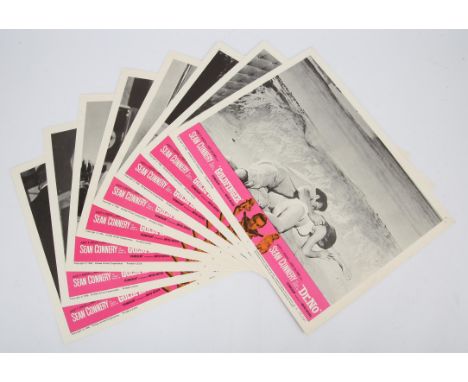 James Bond Goldfinger / Dr. No (R-1966) Set of 8 US Lobby cards, black and white style, flat, 11 x 14 inches (8). 