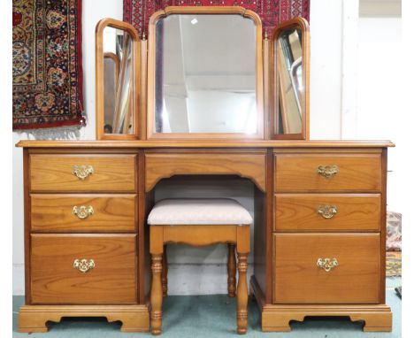 A 20th century reproduction pedestal dressing table with triple plate dressing mirror and upholstered stool Condition Report: