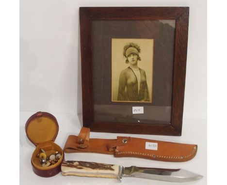An Othello-Hunter knife by Wingen, Solingen, with antler grip and tan leather scabbard; together with a leather horseshoe stu