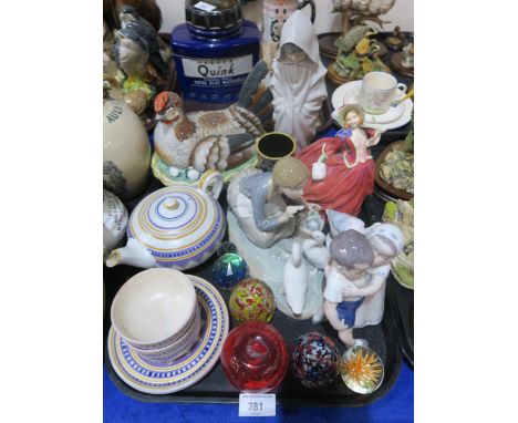 A painted hen egg nest, a Royal Copenhagen figure of children, a Carter Stabler Adams teapot, cup, two saucers, plate and a s