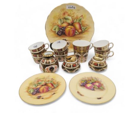 A small group of Royal Crown Derby including six 1128 Imari fluted tea cups, a mug, two table lighters and a vase, together w