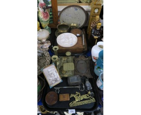 Two Persian brass trays, a pair of postage scales, a pair of brass candlesticks, a dolls hospital photograph in frame etc Con