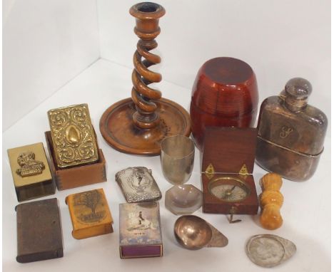 An olivewood candlestick with spiral twist stem, pocket compass, Mauchline ware vesta case showing&nbsp;The Big Tree, North I