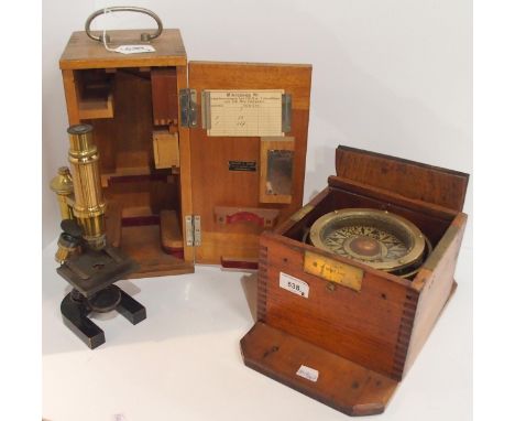 An oak-cased binnacle compass by Mercantile Stores Ltd. of Middlesbrough, together with a cased microscope by E. Leitz Wetzla