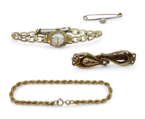 A 9ct gold rope chain bracelet, 9ct faux pearl brooch, a 9ct Rotary watch head with gold plated strap, and a yellow metal bro