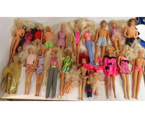A collection of vintage Barbie dolls, mostly 1990s/00s-era, together with a small collection of Action Men of a similar vinta