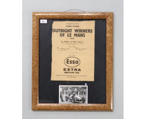 A framed Esso Extra Motor Oil advertisement congratulating Ecurie Ecosse, Outright Winners of Le Mans 1956, with photograph m