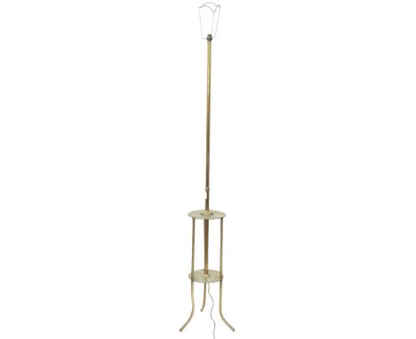 A brass two tiered standard lamp, 195cm high Condition Report:Available upon request