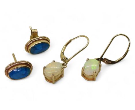 A 9ct gold pair of white opal earrings, together with a pair of turquoise earrings 4gms Condition Report:Available upon reque