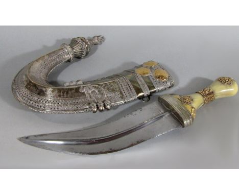 Middle Eastern silver metal ornate Jambiya dagger with gold metal medallion decoration, Arabic inscription, with bone decorat