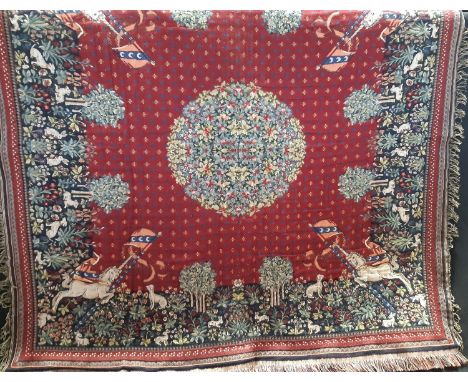 Flemish tapestry table cloth with fringed border featuring unicorns, dogs, rabbits in a flower and orchard border surrounding