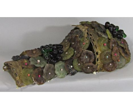 A single decorative wall light with glass floral decoration and glass beaded grapes 
