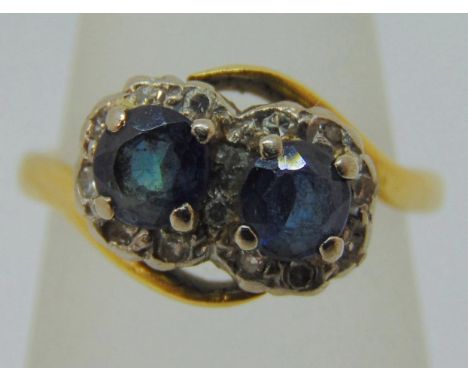 Early 20th century 18ct sapphire and diamond crossover ring, size K, 3.6g 
