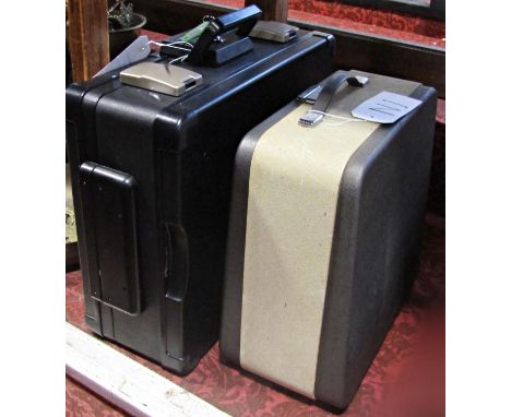 A Honeywell fire proof portable safe, model 1104G (weight 24kg) (with key) and a cased Olympia Monica typewriter, circa 1950/