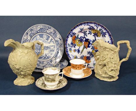 Two 19th century Copeland and Garrett buff glazed relief moulded jugs, one with bacchanalian scene with impressed marks to ba