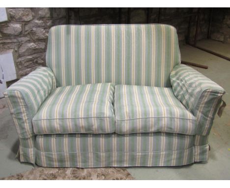 A two seat sofa with shaped outline, upholstered finish with alternating striped upholstery and loose seat cushions, 143 cm, 