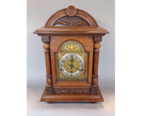 Late 19th century oak bracket clock, the case of architectural form with Wurttemberg three train movement 