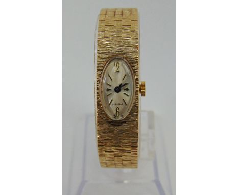 Vintage 9ct ladies dress watch with textured strap, maker 'Gr', London 1972, 26.7g gross 