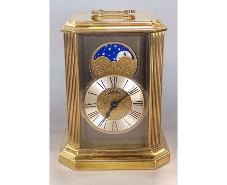 Unusual brass cased Hermle quartz moon phase mantel clock, 21cm high 