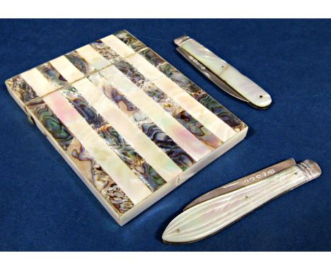 Two antique silver and mother-of-pearl folding fruit knives to include one with fluted baluster handle, together with a furth